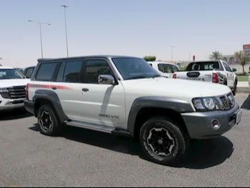 Nissan  Patrol  Super Safari  2022  Automatic  13,000 Km  6 Cylinder  Four Wheel Drive (4WD)  SUV  White  With Warranty