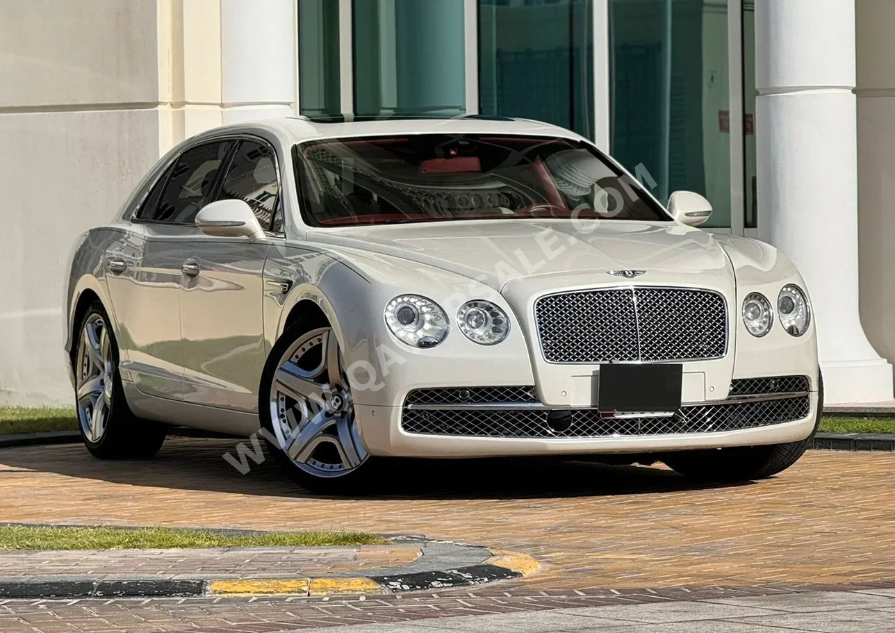 Bentley  Continental  Flying Spur  2014  Automatic  89,000 Km  12 Cylinder  All Wheel Drive (AWD)  Sedan  White