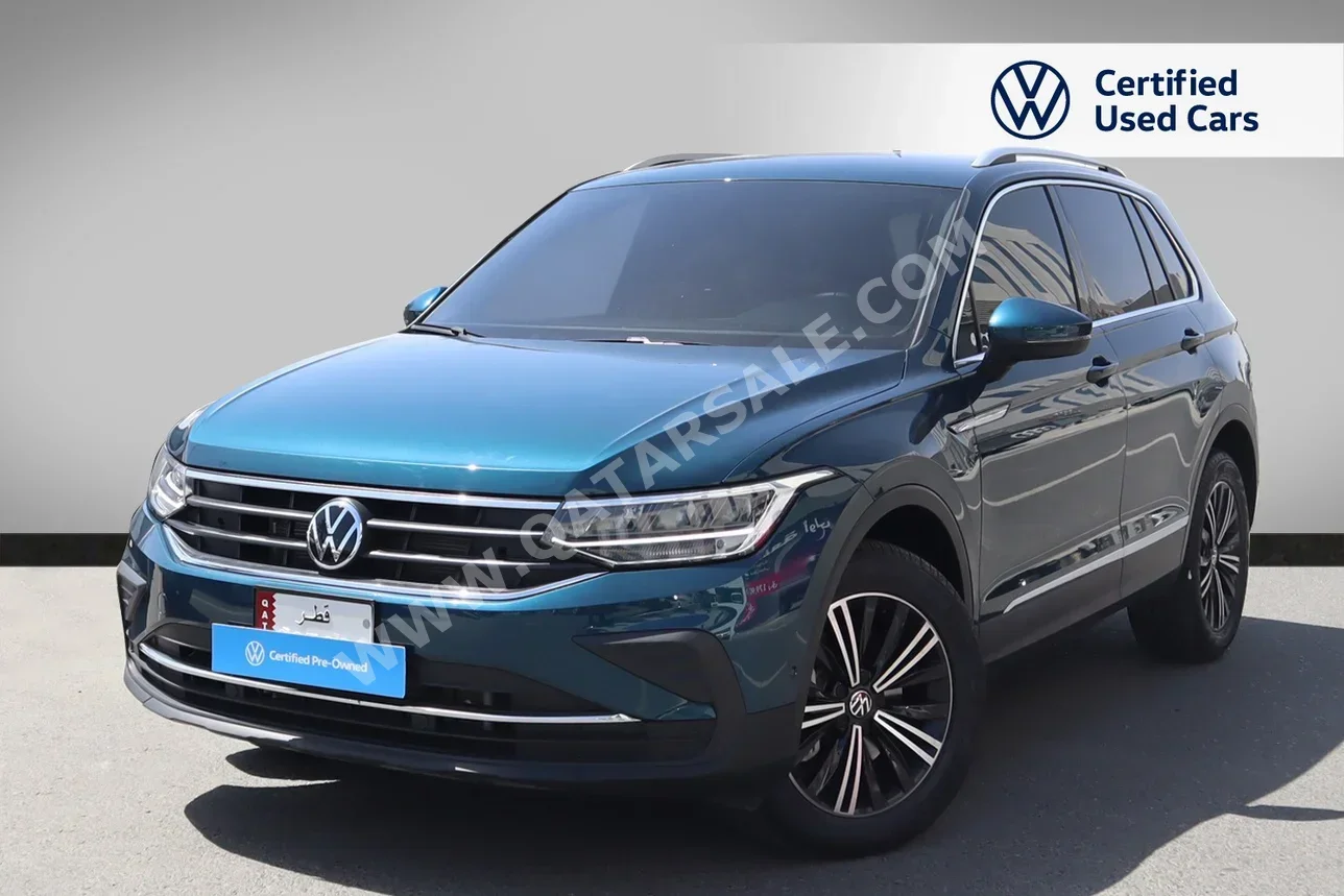 Volkswagen  Tiguan  2.0 TSI  2021  Automatic  50,000 Km  4 Cylinder  All Wheel Drive (AWD)  SUV  Blue  With Warranty