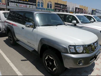 Nissan  Patrol  Super Safari  2022  Automatic  13,000 Km  6 Cylinder  Four Wheel Drive (4WD)  SUV  White  With Warranty