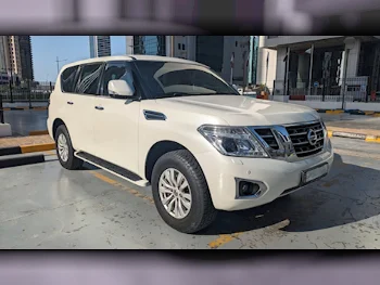 Nissan  Patrol  SE  2015  Automatic  105,000 Km  8 Cylinder  Four Wheel Drive (4WD)  SUV  White