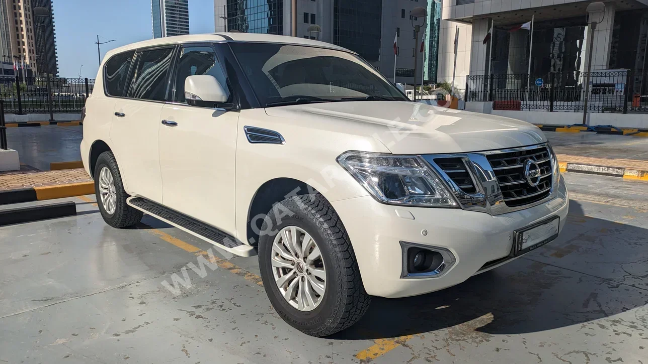 Nissan  Patrol  SE  2015  Automatic  105,000 Km  8 Cylinder  Four Wheel Drive (4WD)  SUV  White