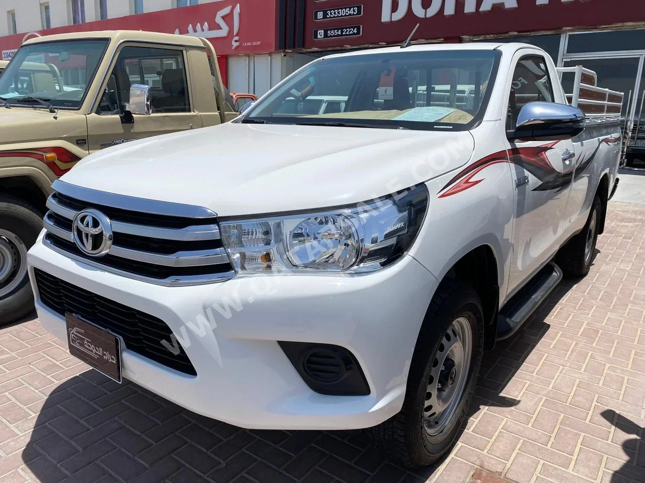 Toyota  Hilux  2023  Manual  9,000 Km  4 Cylinder  Four Wheel Drive (4WD)  Pick Up  White  With Warranty