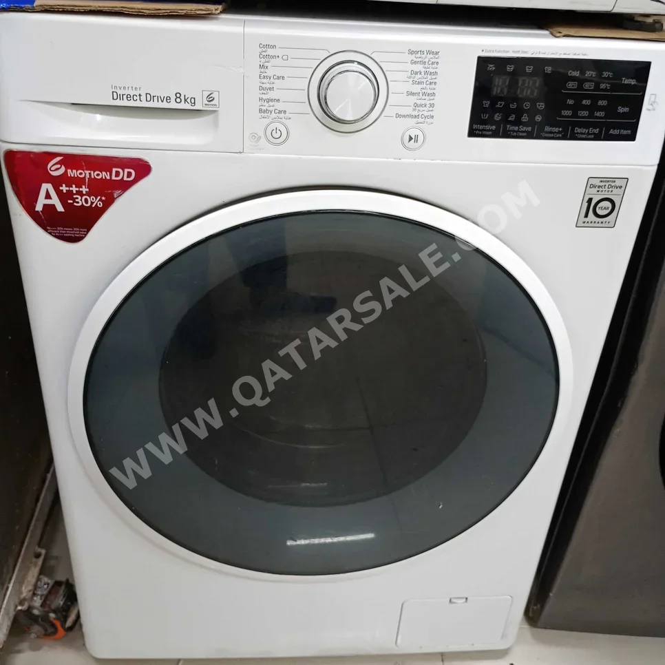 غسالة ملابس & الكل في واحد ال جي \ غسالة تحميل أمامي أبيض