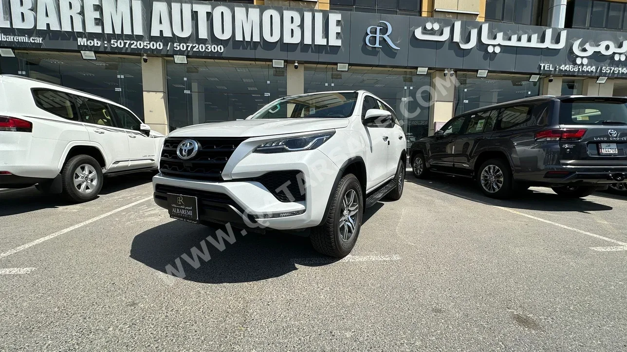  Toyota  Fortuner  2023  Automatic  0 Km  4 Cylinder  Four Wheel Drive (4WD)  SUV  White  With Warranty