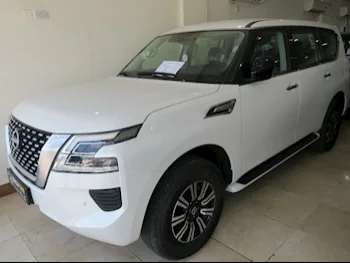  Nissan  Patrol  XE  2023  Automatic  0 Km  6 Cylinder  Four Wheel Drive (4WD)  SUV  White  With Warranty