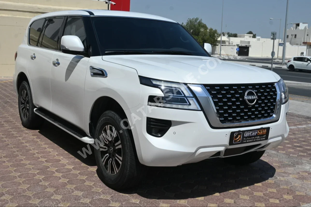 Nissan  Patrol  SE  2022  Automatic  29,000 Km  6 Cylinder  Four Wheel Drive (4WD)  SUV  White  With Warranty