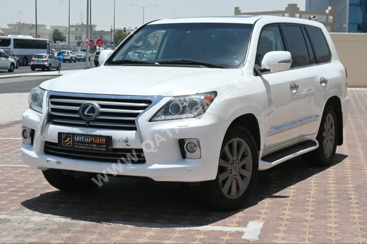  Lexus  LX  570  2013  Automatic  382,000 Km  8 Cylinder  Four Wheel Drive (4WD)  SUV  White  With Warranty