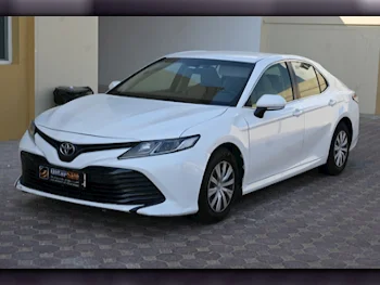 Toyota  Camry  LE  2020  Automatic  97,000 Km  4 Cylinder  Front Wheel Drive (FWD)  Sedan  White