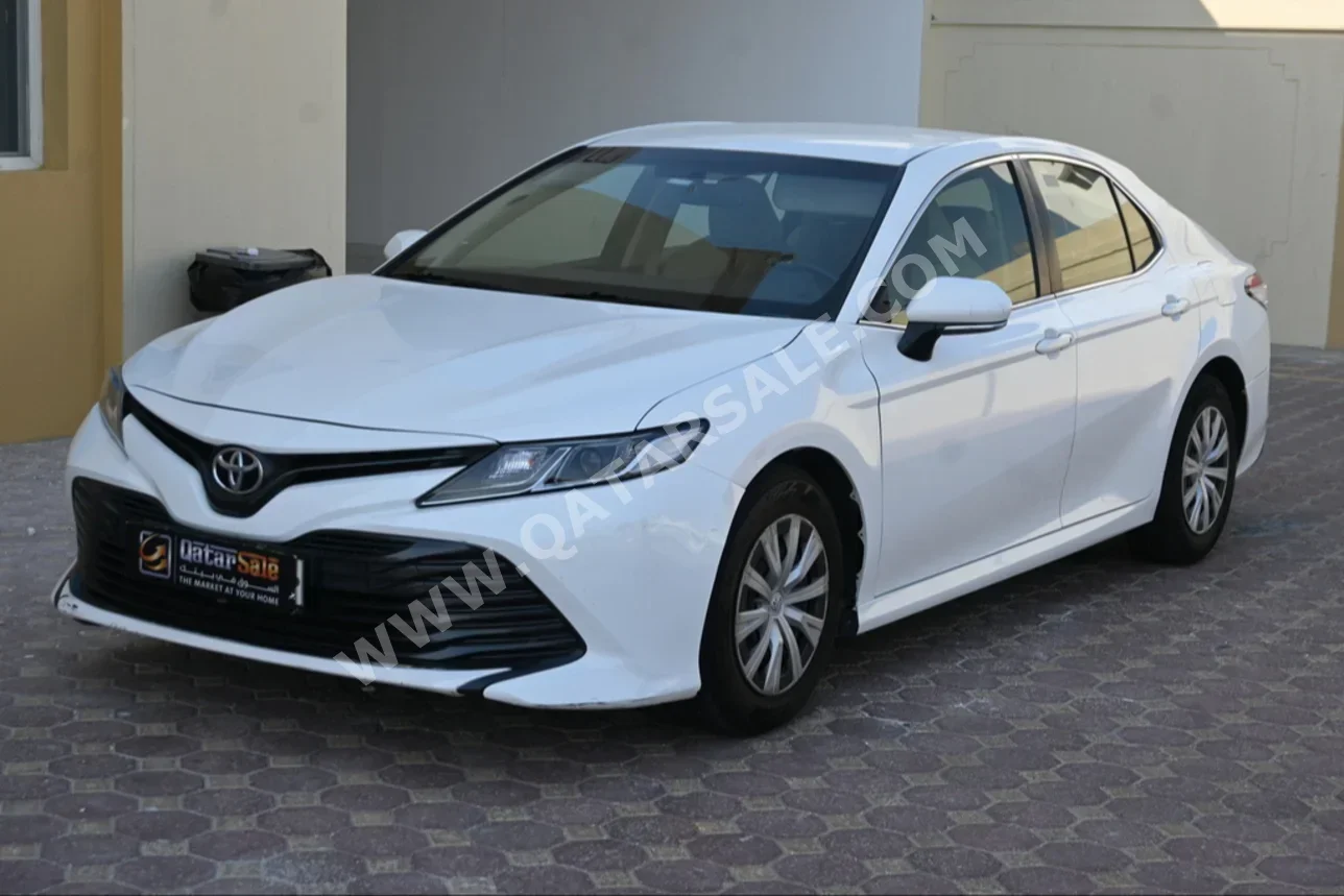 Toyota  Camry  LE  2020  Automatic  97,000 Km  4 Cylinder  Front Wheel Drive (FWD)  Sedan  White