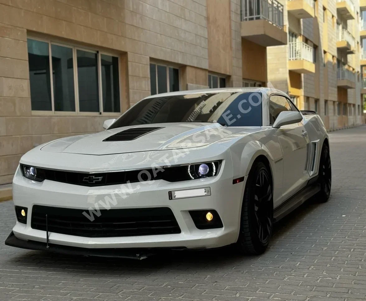 Chevrolet  Camaro  SS  2015  Automatic  67,000 Km  8 Cylinder  Rear Wheel Drive (RWD)  Coupe / Sport  White