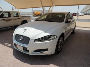 Jaguar  XF  2014  Automatic  131,000 Km  4 Cylinder  Rear Wheel Drive (RWD)  Sedan  White