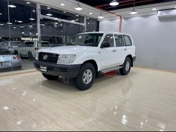 Toyota  Land Cruiser  G  2006  Manual  400,000 Km  6 Cylinder  Four Wheel Drive (4WD)  SUV  White