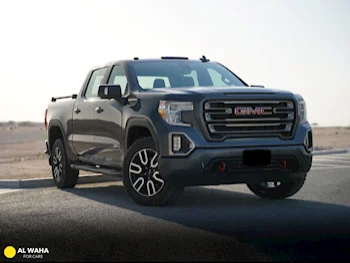 GMC  Sierra  AT4  2019  Automatic  61,000 Km  8 Cylinder  Four Wheel Drive (4WD)  Pick Up  Gray