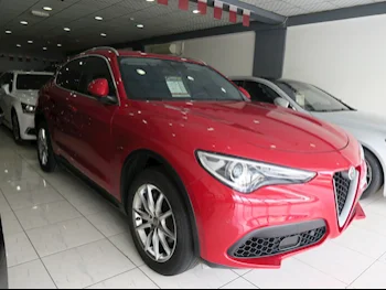 Alfa Romeo  Stelvio  2019  Automatic  94,000 Km  4 Cylinder  Four Wheel Drive (4WD)  Sedan  Red  With Warranty