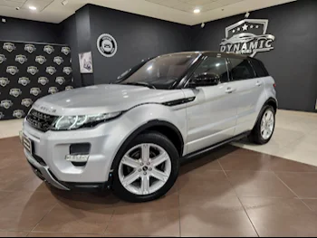 Land Rover  Evoque  Dynamic  2015  Automatic  79,000 Km  4 Cylinder  Four Wheel Drive (4WD)  SUV  Silver