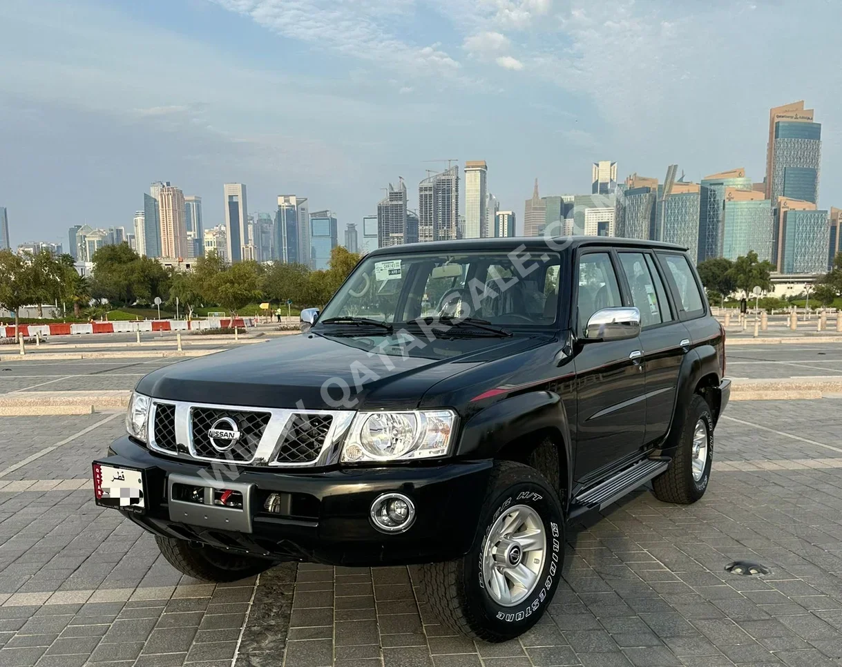 Nissan  Patrol  Safari  2023  Manual  7,000 Km  6 Cylinder  Four Wheel Drive (4WD)  SUV  Black  With Warranty