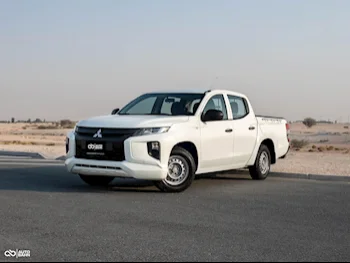 Mitsubishi  L 200  2022  Manual  95,000 Km  4 Cylinder  Rear Wheel Drive (RWD)  Pick Up  White  With Warranty