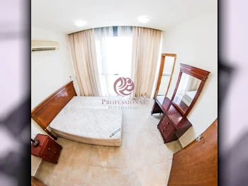 2 Bedrooms  Apartment  For Rent  in Doha -  Al Sadd  Semi Furnished