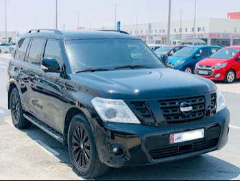 Nissan  Patrol  Platinum  2014  Automatic  234,000 Km  8 Cylinder  Four Wheel Drive (4WD)  SUV  Black