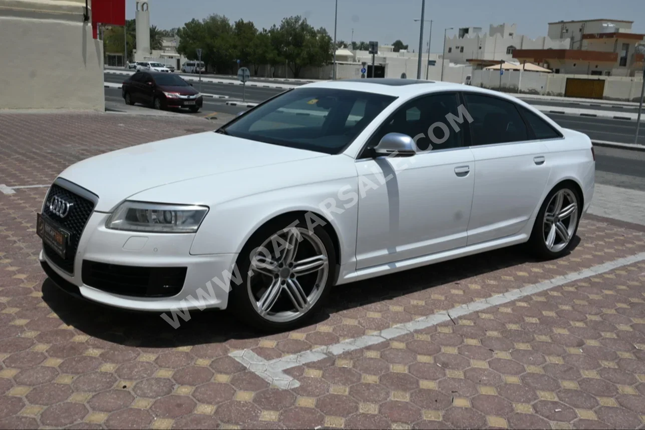 Audi  RS  6  2009  Automatic  63,000 Km  10 Cylinder  Rear Wheel Drive (RWD)  Sedan  White