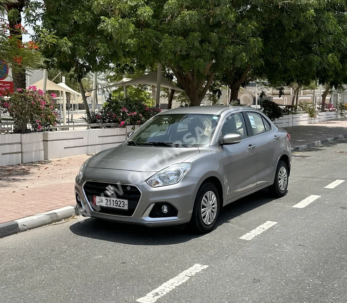 Suzuki  Dzire  2022  Automatic  54,500 Km  4 Cylinder  Front Wheel Drive (FWD)  Sedan  Gray  With Warranty