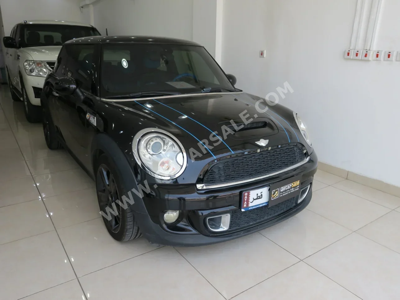 Mini  Cooper  2013  Automatic  115,000 Km  4 Cylinder  Front Wheel Drive (FWD)  Hatchback  Black