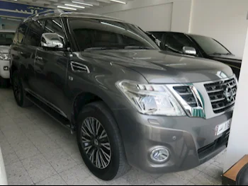 Nissan  Patrol  Platinum  2015  Automatic  162,000 Km  8 Cylinder  Four Wheel Drive (4WD)  SUV  Gray