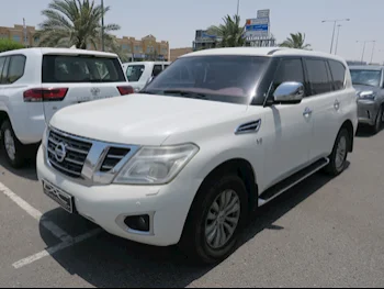 Nissan  Patrol  SE  2014  Automatic  448,000 Km  8 Cylinder  Four Wheel Drive (4WD)  SUV  White