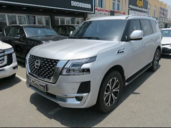 Nissan  Patrol  Titanium  2023  Automatic  7,000 Km  8 Cylinder  Four Wheel Drive (4WD)  SUV  Silver  With Warranty