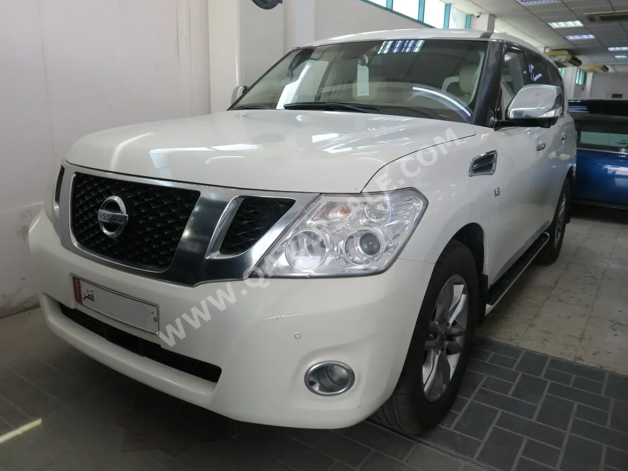 Nissan  Patrol  Platinum  2013  Automatic  360,000 Km  8 Cylinder  Four Wheel Drive (4WD)  SUV  White