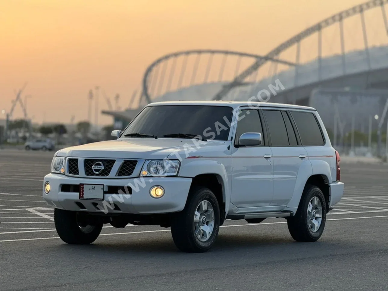 Nissan  Patrol  Safari  2021  Manual  35,000 Km  6 Cylinder  Four Wheel Drive (4WD)  SUV  White  With Warranty