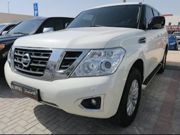 Nissan  Patrol  XE  2019  Automatic  129,000 Km  8 Cylinder  Four Wheel Drive (4WD)  SUV  White