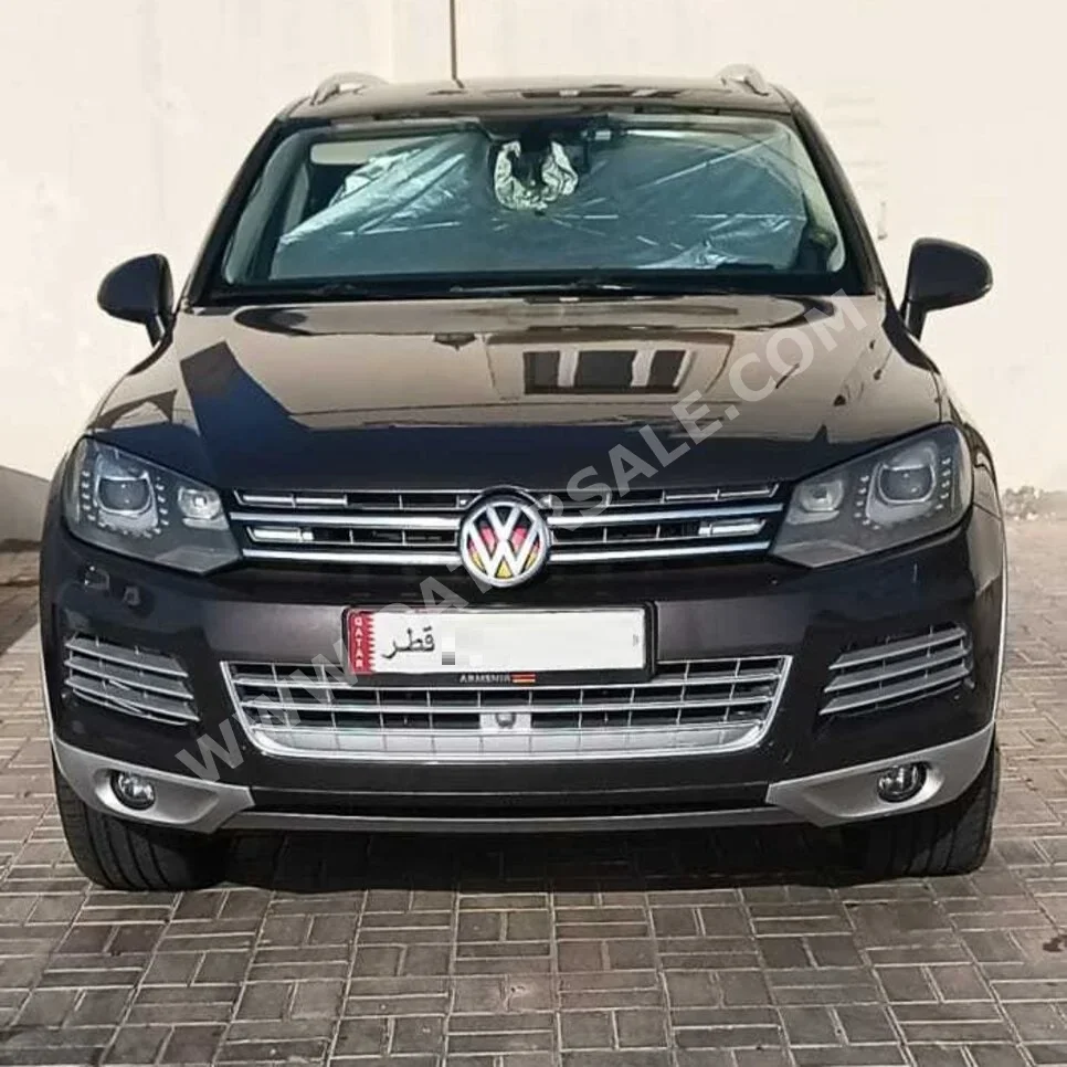 Volkswagen  Touareg  Sport  2011  Tiptronic  245,500 Km  6 Cylinder  All Wheel Drive (AWD)  SUV  Brown