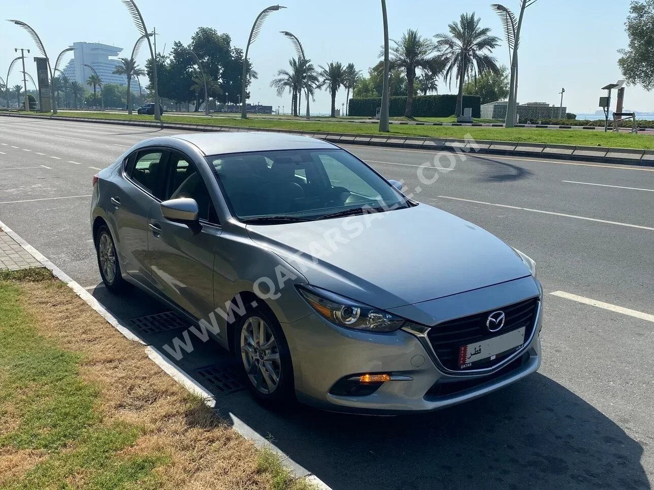 Mazda  Mazda 3  2017  Automatic  83,000 Km  4 Cylinder  Rear Wheel Drive (RWD)  Sedan  Silver