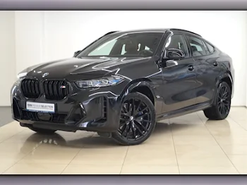 BMW  X-Series  X6 M60i  2024  Automatic  14,000 Km  8 Cylinder  Four Wheel Drive (4WD)  SUV  Black  With Warranty