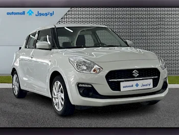 Suzuki  Swift  2024  Automatic  33,750 Km  4 Cylinder  Front Wheel Drive (FWD)  Hatchback  White  With Warranty