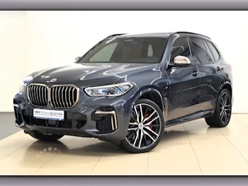 BMW  X-Series  X5 M50i  2023  Automatic  9٬000 Km  8 Cylinder  Four Wheel Drive (4WD)  SUV  Gray  With Warranty