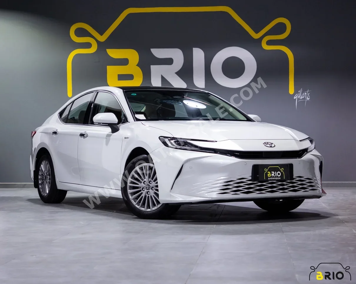 Toyota  Camry  Hybrid  2024  Automatic  0 Km  4 Cylinder  Front Wheel Drive (FWD)  Sedan  White