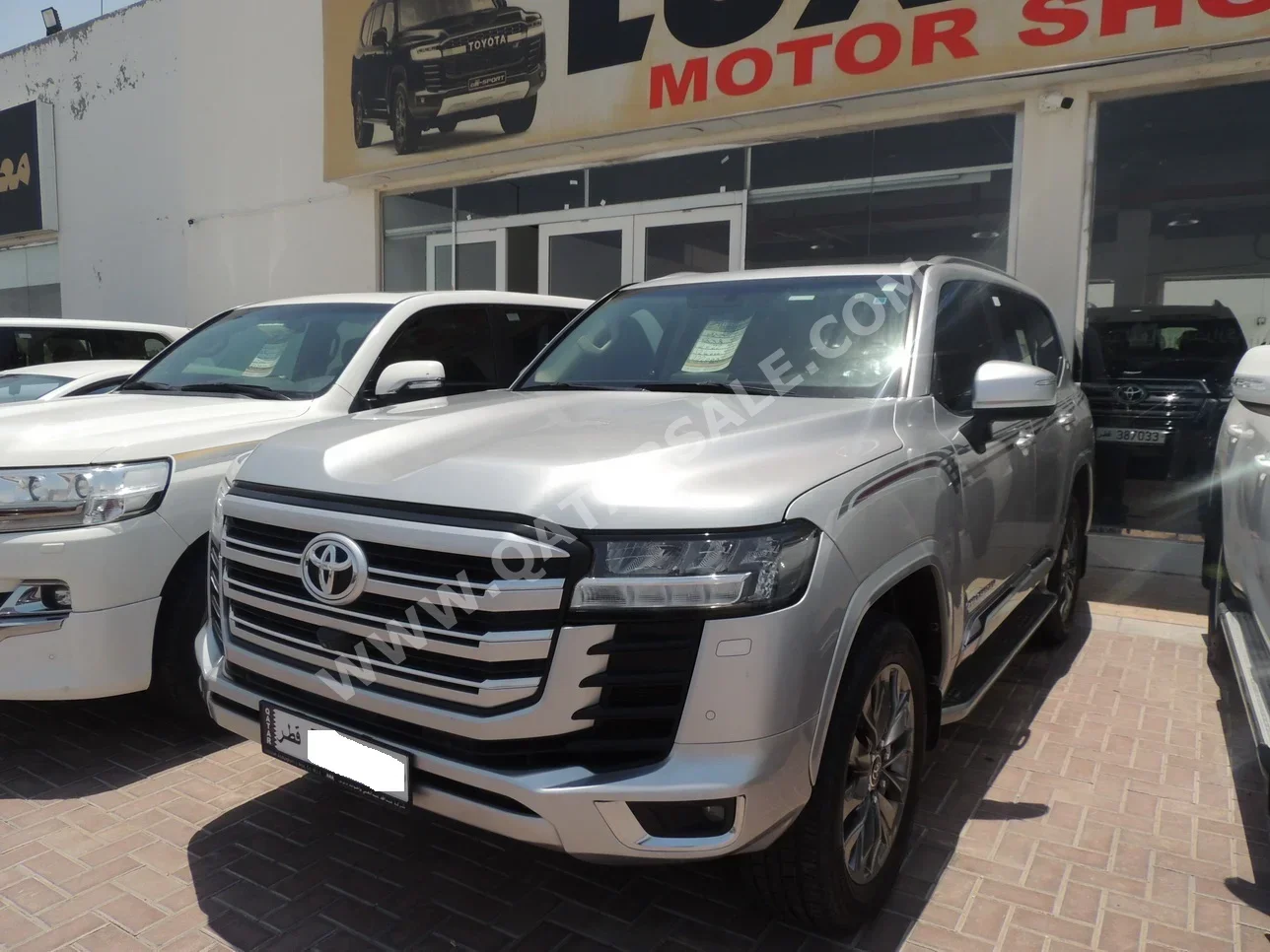  Toyota  Land Cruiser  GXR Twin Turbo  2022  Automatic  124,000 Km  6 Cylinder  Four Wheel Drive (4WD)  SUV  Silver  With Warranty