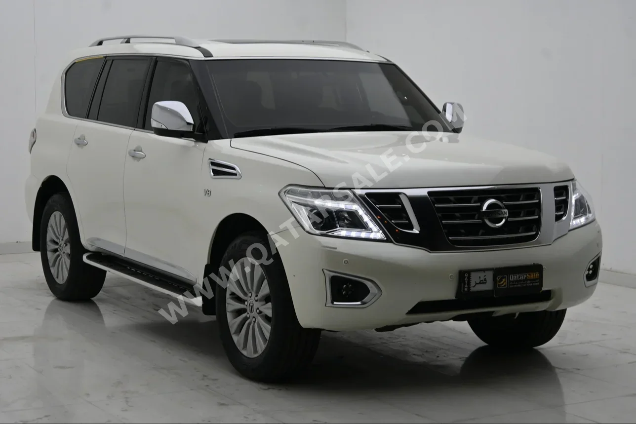 Nissan  Patrol  Platinum  2016  Automatic  340,000 Km  8 Cylinder  Four Wheel Drive (4WD)  SUV  White