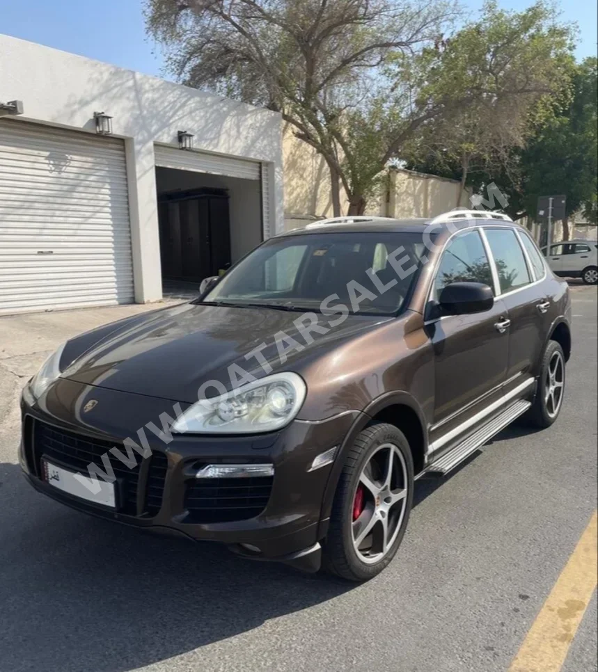 Porsche  Cayenne  Turbo  2009  Automatic  146,000 Km  8 Cylinder  Four Wheel Drive (4WD)  SUV  Dark Brown