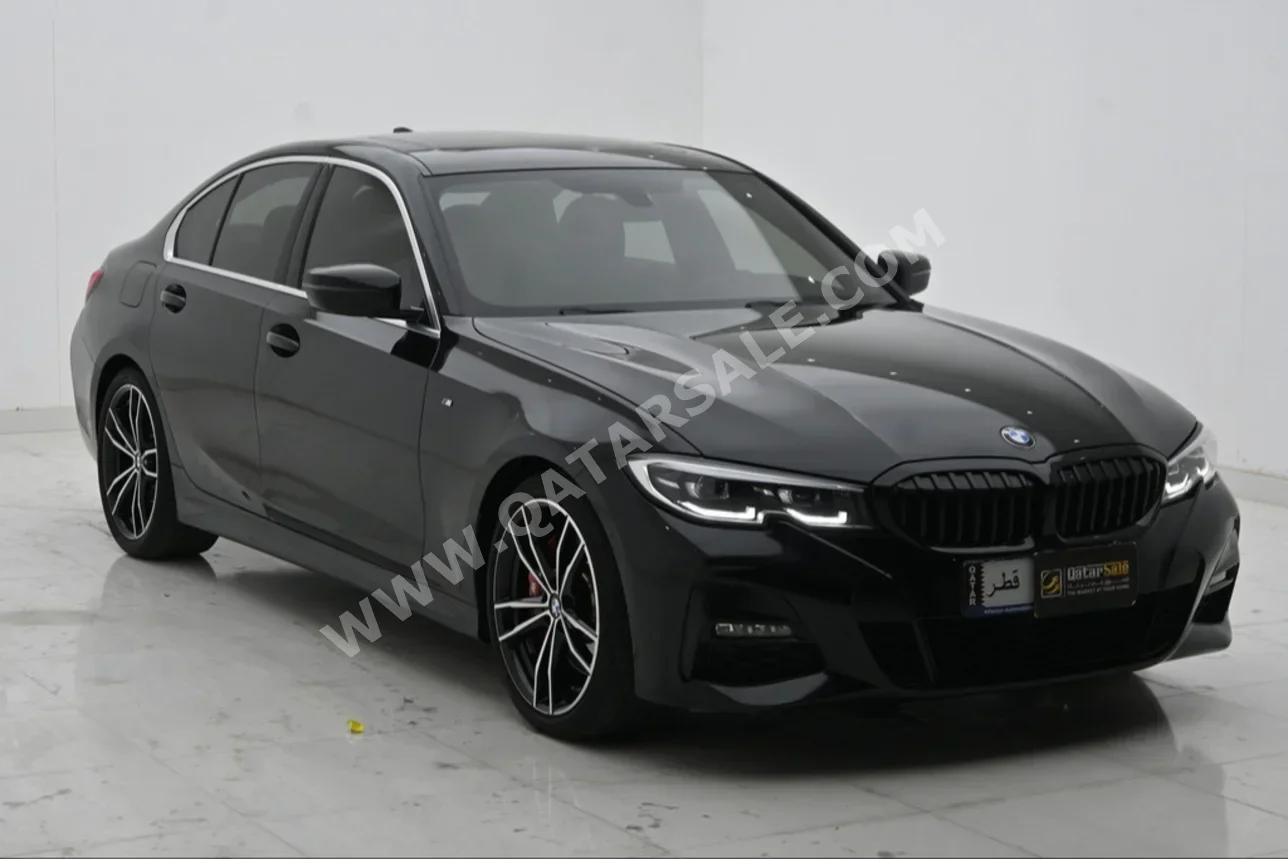 BMW  3-Series  330i  2021  Automatic  33,000 Km  4 Cylinder  Rear Wheel Drive (RWD)  Sedan  Black  With Warranty