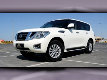 Nissan  Patrol  SE  2015  Automatic  104,000 Km  8 Cylinder  Four Wheel Drive (4WD)  SUV  White