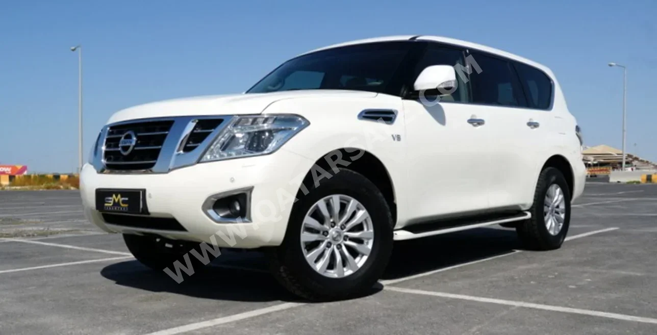 Nissan  Patrol  SE  2015  Automatic  104,000 Km  8 Cylinder  Four Wheel Drive (4WD)  SUV  White