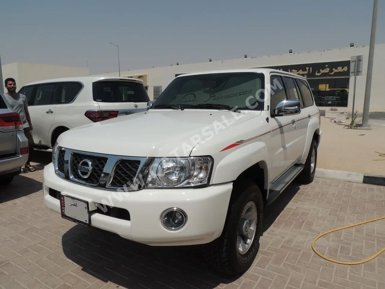 Nissan  Patrol  Safari  2023  Manual  8٬000 Km  6 Cylinder  Four Wheel Drive (4WD)  SUV  White  With Warranty