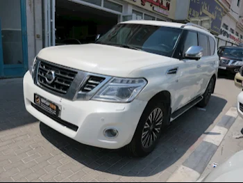  Nissan  Patrol  Platinum  2016  Automatic  248,000 Km  8 Cylinder  Four Wheel Drive (4WD)  SUV  White  With Warranty