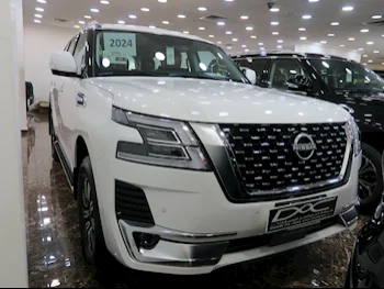 Nissan  Patrol  Titanium  2024  Automatic  0 Km  6 Cylinder  Four Wheel Drive (4WD)  SUV  White  With Warranty