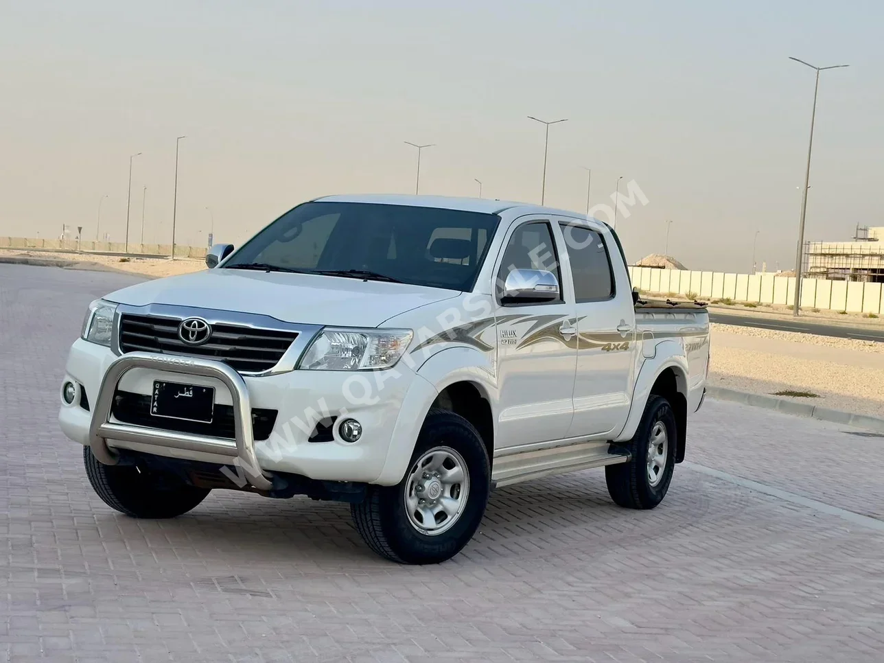 Toyota  Hilux  SR5  2015  Automatic  91,000 Km  4 Cylinder  Four Wheel Drive (4WD)  Pick Up  White