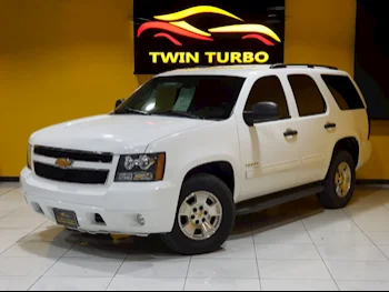 Chevrolet  Tahoe  2012  Automatic  233,000 Km  8 Cylinder  Four Wheel Drive (4WD)  SUV  White